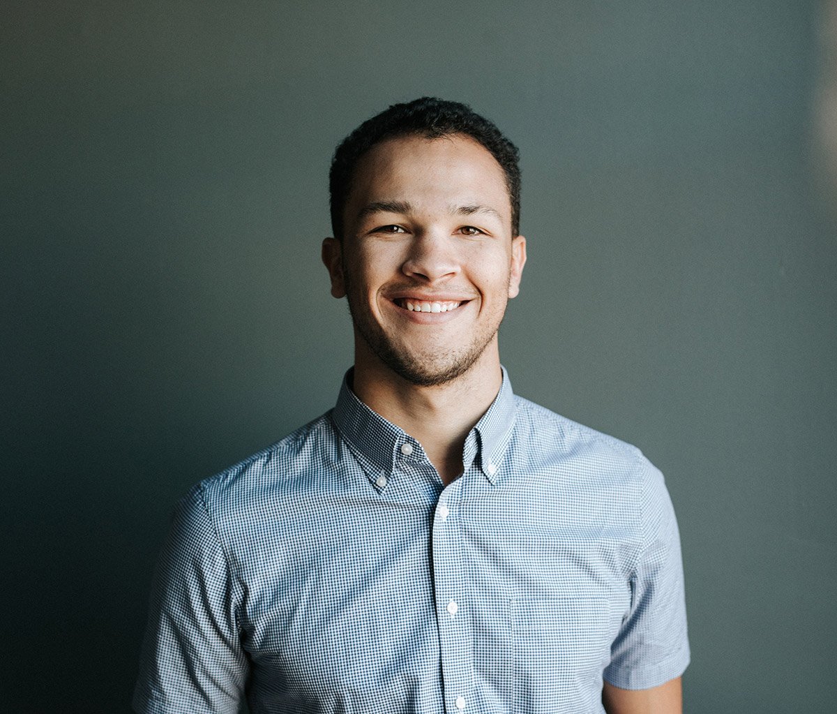 male employee smiling - botkeeper